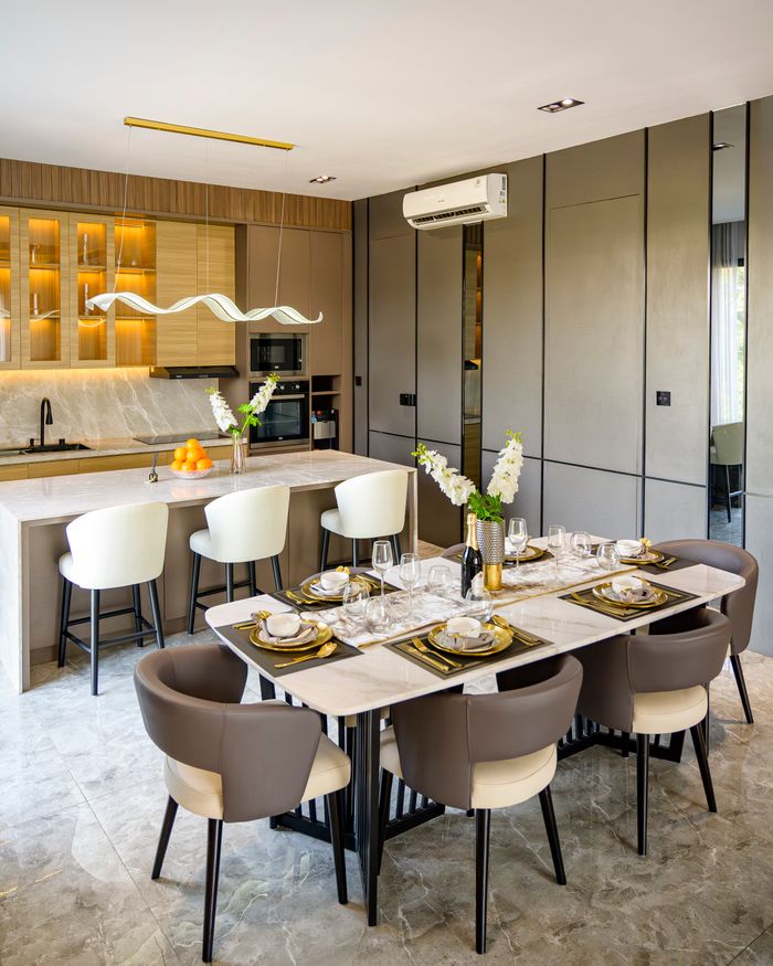 gallery-3 Chic and contemporary dining and kitchen area with elegant decor in Jakarta apartment.